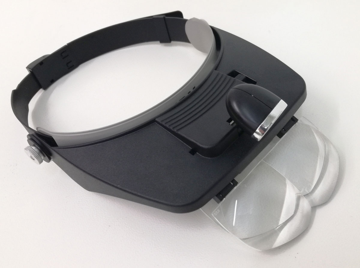 Hlavový štít s LED světlem a zvětšovacím sklem pro jemnou mechaniku