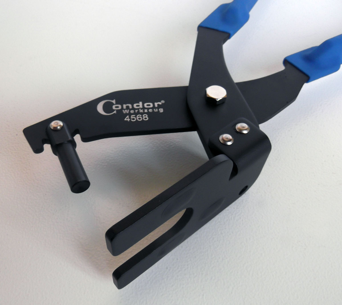 Kleště na demontáž závěsných gum výfukového potrubí, Triumf